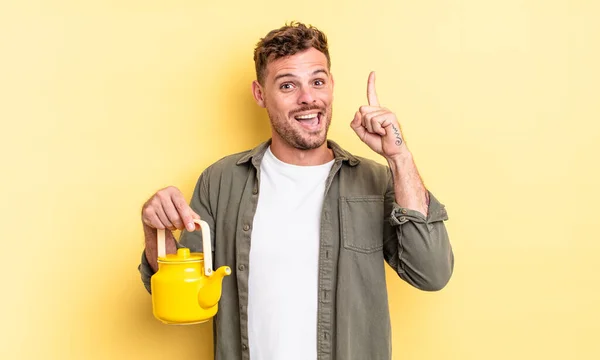 Young Handsome Man Feeling Happy Excited Genius Realizing Idea Teapot — Stock Photo, Image