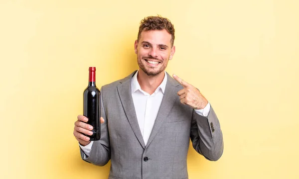 Young Handsome Man Smiling Confidently Pointing Own Broad Smile Bottle — Stock Photo, Image