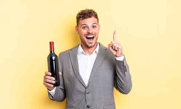 Young Handsome Man Feeling Happy Excited Genius Realizing Idea Bottle — Stock Photo, Image