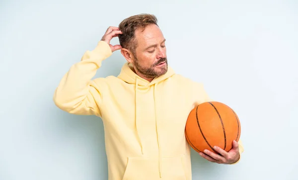 Middle Age Handsome Man Feeling Puzzled Confused Scratching Head Basketball — Stock Photo, Image
