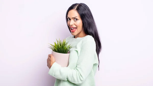 Pretty Hispanic Woman Looking Happy Pleasantly Surprised House Plant Concept — Stock Photo, Image