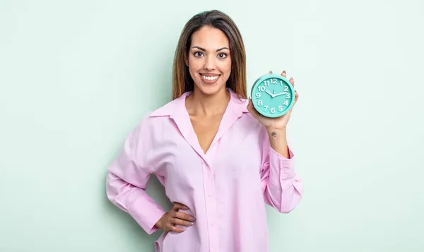 Pretty Hispanic Woman Smiling Happily Hand Hip Confident Alarm Clock — Stock Photo, Image