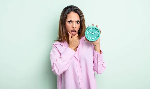 Pretty Hispanic Woman Mouth Eyes Wide Open Hand Chin Alarm — Stock Photo, Image