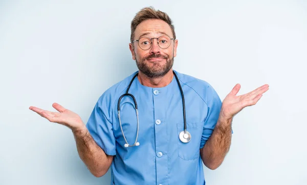 Middle Age Handsome Man Feeling Puzzled Confused Doubting Nurse Concept — Stock Photo, Image
