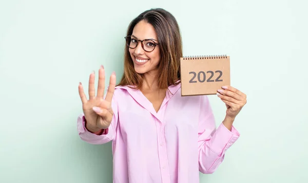 Pretty Hispanic Woman Smiling Looking Friendly Showing Number Four 2022 — Stock Photo, Image