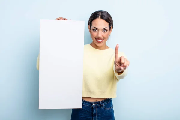 Pretty Hispanic Woman Smiling Proudly Confidently Making Number One Blank — Stock Photo, Image