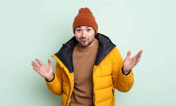 Young Handsome Man Feeling Puzzled Confused Doubting Cold Weather Concept — Stock Photo, Image