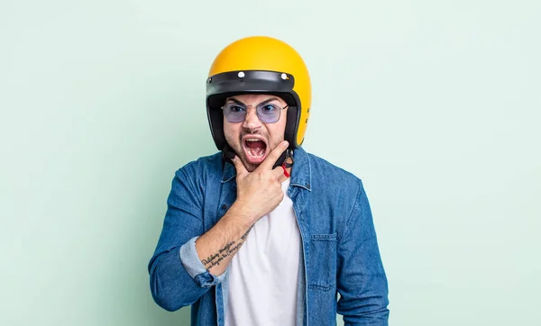 Young Handsome Man Mouth Eyes Wide Open Hand Chin Motorbike — Stockfoto