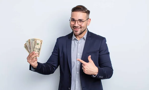 Young Handsome Man Looking Excited Surprised Pointing Side Dollar Banknotes — Stock Photo, Image