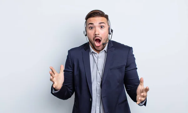 Young Handsome Man Feeling Extremely Shocked Surprised Telearketer Concept — Stock Photo, Image