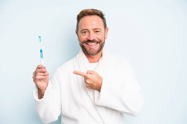 Middle Age Man Looking Excited Surprised Pointing Side Toothbrush Concept — Photo