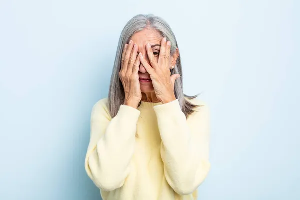 Middle Age Gray Hair Woman Covering Face Hands Peeking Fingers — Stock Photo, Image