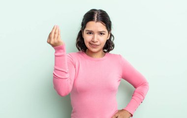 Güzel genç bir kadın kapiş ya da para hareketi yapıyor, sana borçlarını ödemeni söylüyor.!