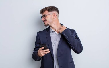 young handsome man feeling stressed, anxious, tired and frustrated. business concept