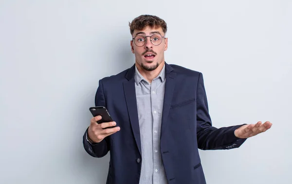 Young Handsome Man Amazed Shocked Astonished Unbelievable Surprise Business Concept — Stock Photo, Image