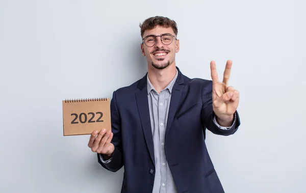 Young Handsome Man Smiling Looking Friendly Showing Number Two Calendar — Stock Photo, Image