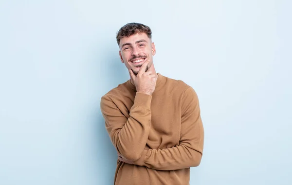 Young Handsome Man Looking Happy Smiling Hand Chin Wondering Asking — Stock Photo, Image