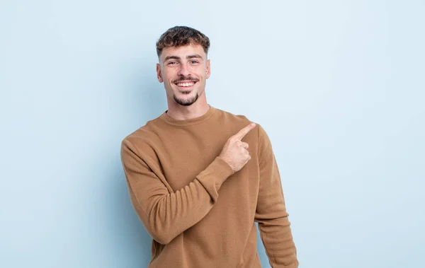 Young Handsome Man Smiling Cheerfully Feeling Happy Pointing Side Upwards — Stock Photo, Image
