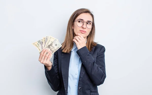 Young Pretty Woman Thinking Feeling Doubtful Confused Dollar Banknotes Concept — Stock Photo, Image