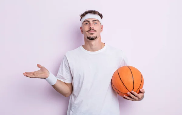 Young Handsome Man Feeling Puzzled Confused Doubting Basketball Concept — Stock Photo, Image
