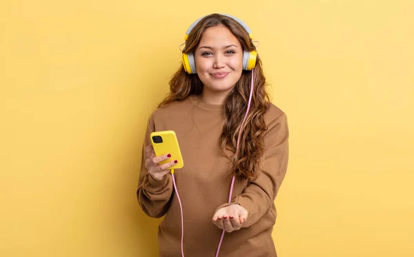 Hispanic Pretty Woman Smiling Happily Friendly Offering Showing Concept Headphones — Stock Photo, Image