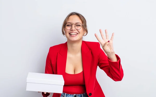 Hispanic Pretty Woman Smiling Looking Friendly Showing Number Four Package — Stock Photo, Image