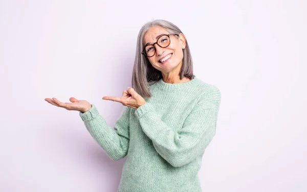 Senior Pretty Woman Smiling Cheerfully Pointing Copy Space Palm Side — Stock Photo, Image