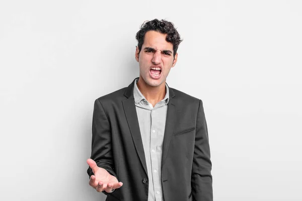 Νεαρός Επιχειρηματίας Φαίνεται Θυμωμένος Ενοχλημένος Και Απογοητευμένος Ουρλιάζοντας Wtf Είναι — Φωτογραφία Αρχείου