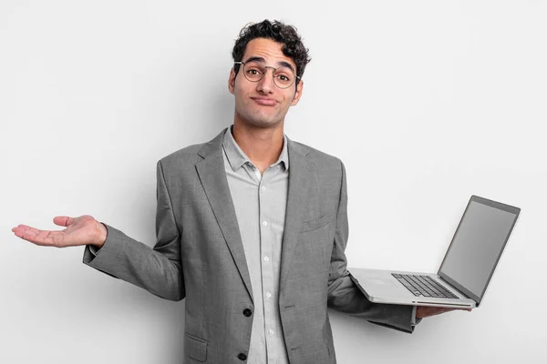 Hispanic Handsome Man Feeling Puzzled Confused Doubting Business Laptop Concept — Stock Photo, Image