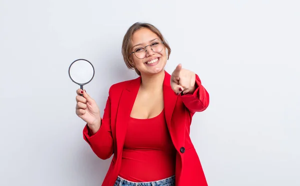 Hispanic Pretty Woman Pointing Camera Choosing You Magnifying Glass Concept — Stock Photo, Image