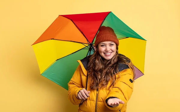 Hispanic Pretty Woman Smiling Happily Friendly Offering Showing Concept Umbrella — Stock Photo, Image