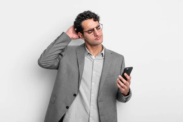 Hispanic Handsome Man Feeling Puzzled Confused Scratching Head Business Phone — Stock Photo, Image