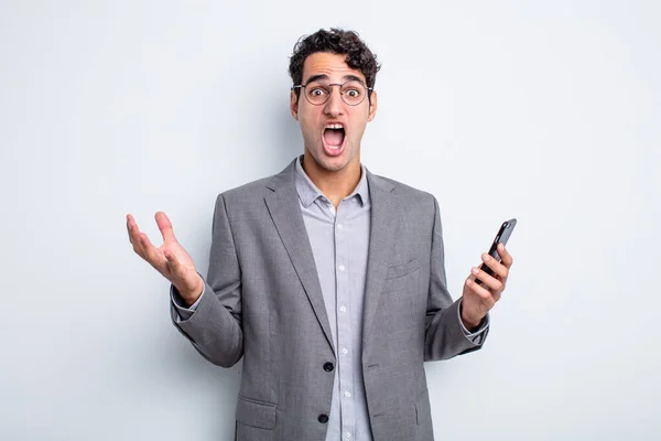 Hispanic Handsome Man Feeling Extremely Shocked Surprised Business Phone Concept — Stock Photo, Image