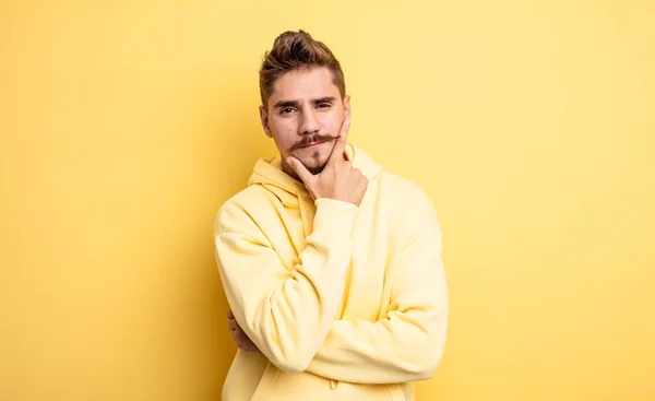 Young Handsome Man Looking Serious Thoughtful Distrustful One Arm Crossed — Stock Photo, Image