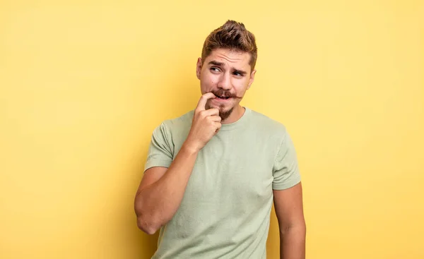 Young Handsome Man Surprised Nervous Worried Frightened Look Looking Side — Stock Photo, Image