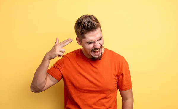 Young Handsome Man Looking Unhappy Stressed Suicide Gesture Making Gun — Stock Photo, Image