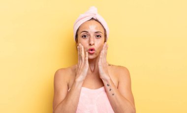 pretty woman feeling shocked and scared. shower and beauty concept