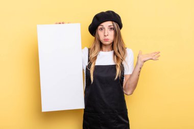 woman artist feeling puzzled and confused and doubting empty canvas concept