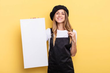 woman artist looking arrogant, successful, positive and proud empty canvas concept