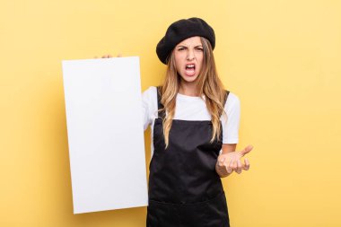 woman artist looking angry, annoyed and frustrated empty canvas concept