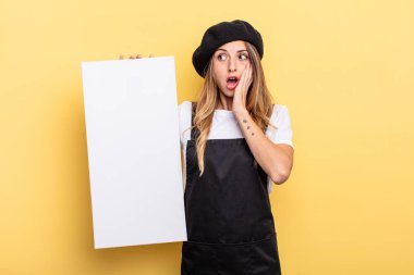 woman artist feeling happy, excited and surprised empty canvas concept