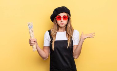 artist painter feeling puzzled and confused and doubting