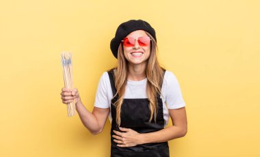 artist painter laughing out loud at some hilarious joke