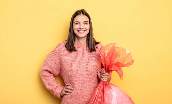 Pretty Woman Smiling Happily Hand Hip Confident Trash Bag Concept — Stockfoto