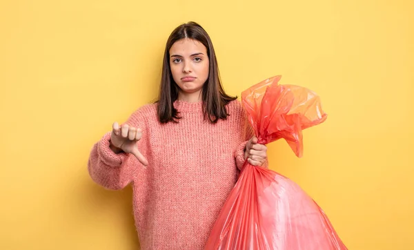 Pretty Woman Feeling Cross Showing Thumbs Trash Bag Concept — Foto Stock