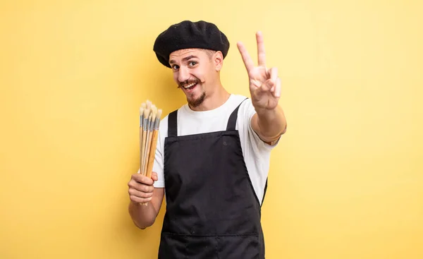 Artist Painter Smiling Looking Friendly Showing Number Two — Stock Photo, Image