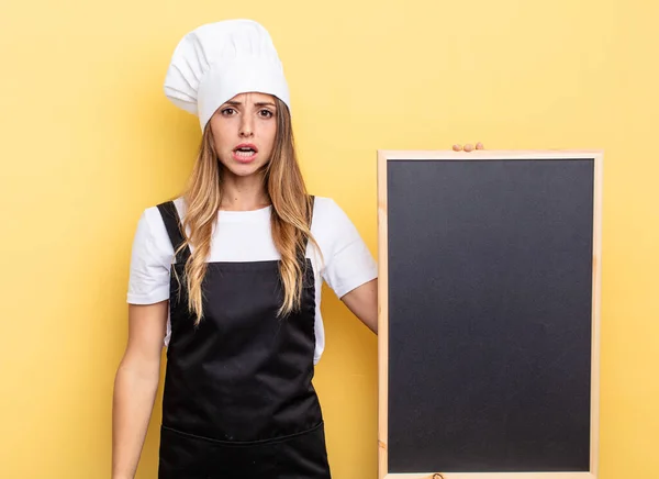 Chef Woman Looking Very Shocked Surprised Blackboard Menu Concept — Stockfoto