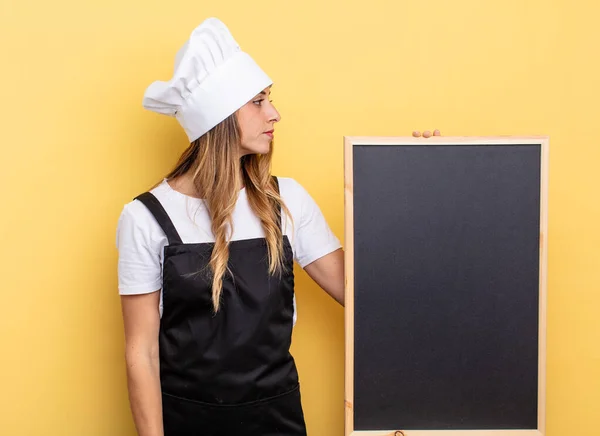 Chef Woman Profile View Thinking Imagining Daydreaming Blackboard Menu Concept — Stockfoto