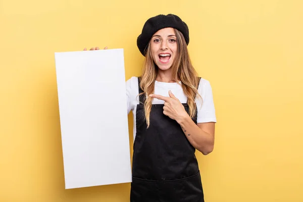 Woman Artist Looking Excited Surprised Pointing Side Empty Canvas Concept — Stockfoto