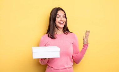 pretty woman feeling happy, surprised realizing a solution or idea. white box packaging concept